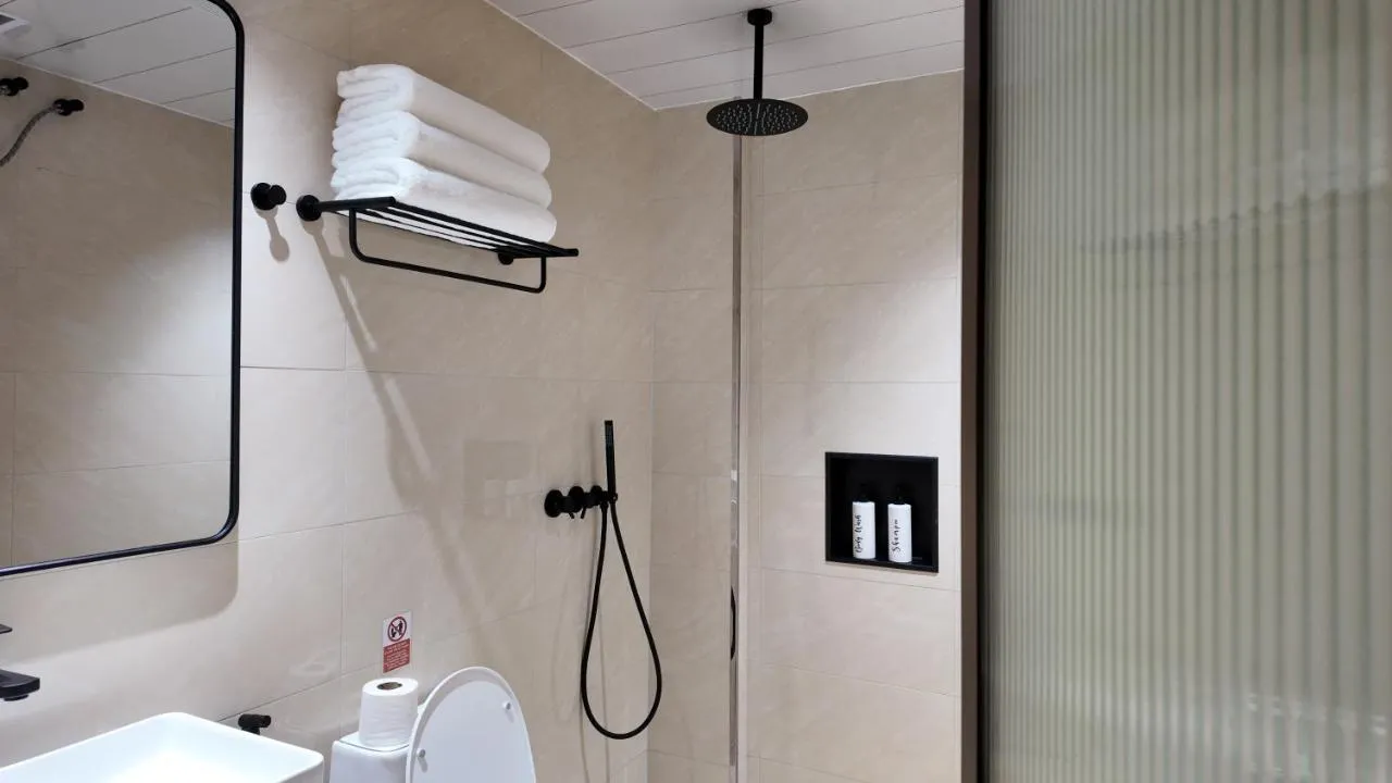 Bathroom with rain shower and matte black fittings