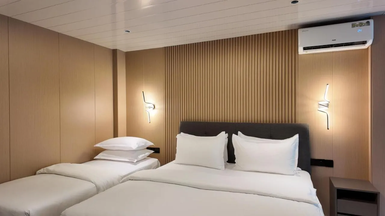 Triple Room with City View at Palmcasa